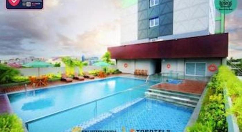 Ayola First Point Hotel Pakanbaru Exteriör bild